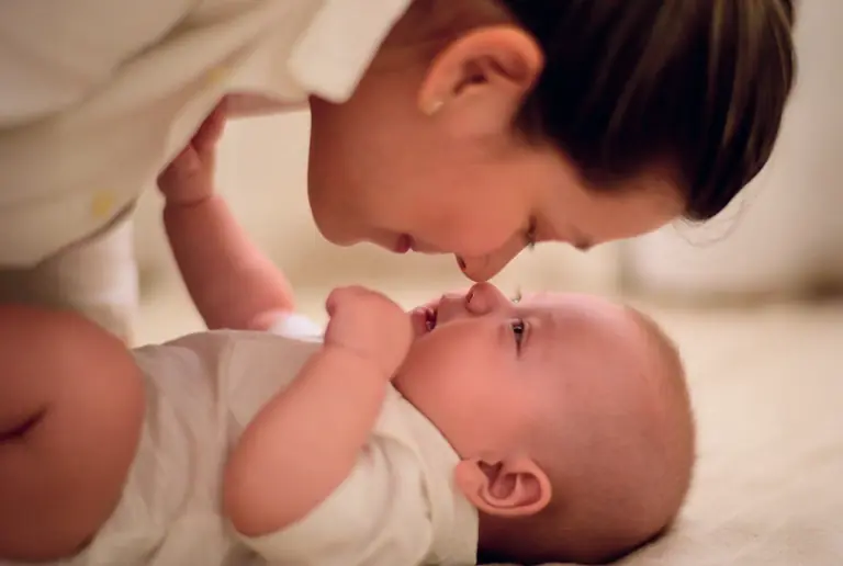 Certified newborn care specialist bonding with infant – Maternal Inc