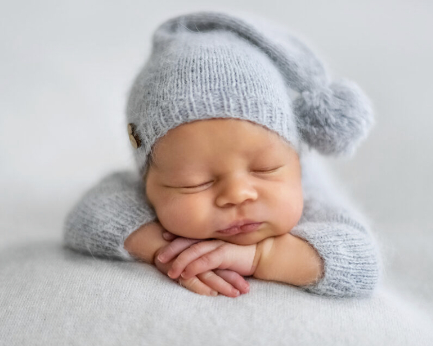 baby sleeping in bed with parents